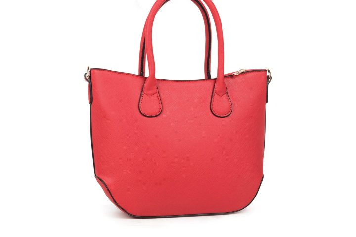 Tote bag en toile de coton et anses en cuir posé à plat